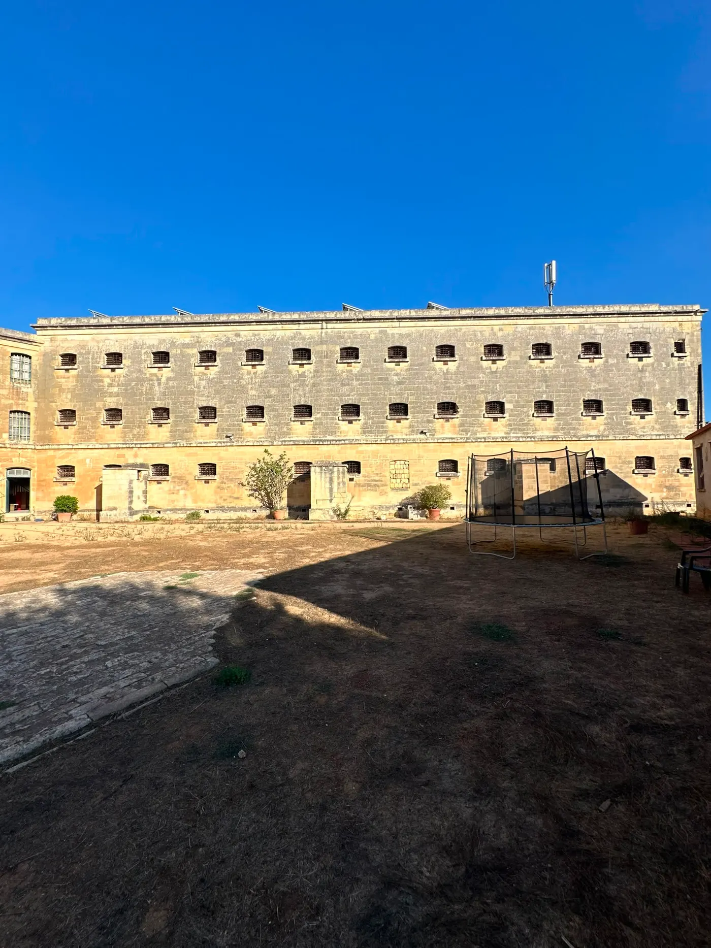 Prison cell block facade