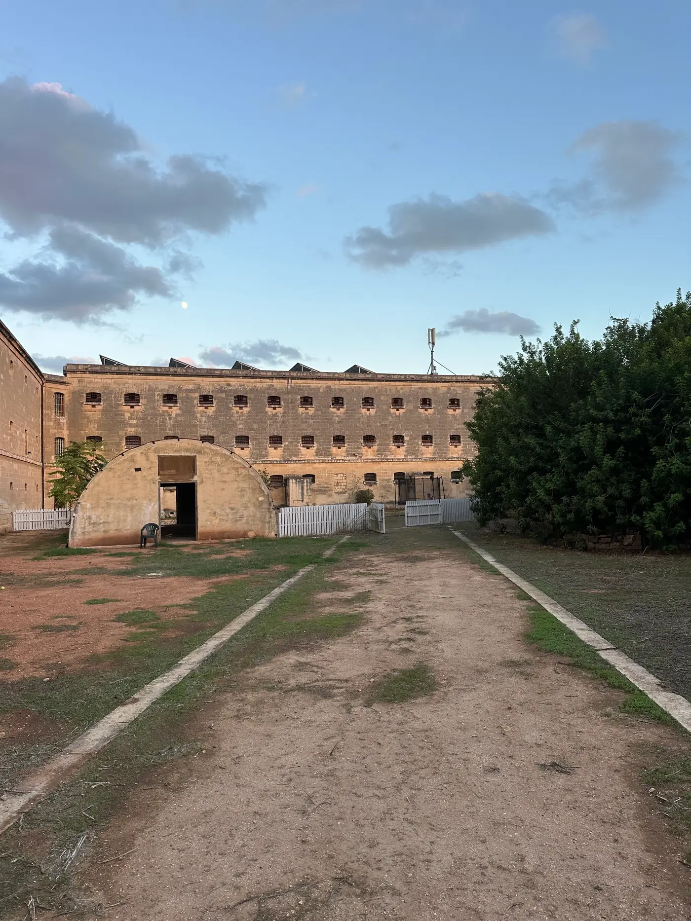 Barred cell windows of the historic prison wing